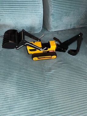 Tonka excavator/backhoe/bulldozer - metal with plastic shovel parts